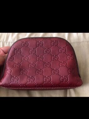 Gucci Burgundy Embossed GG Leather Pouch